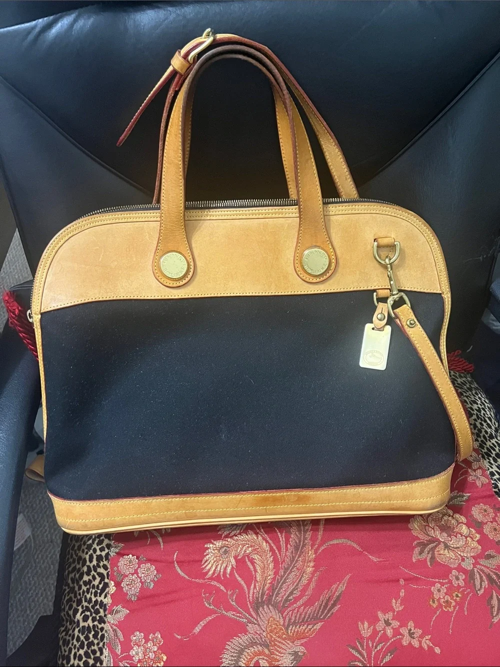Dooney & Bourke Black and Tan Satchel with Gold Hardware